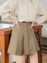 Minifalda plisada preppy